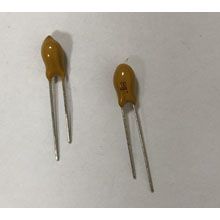 2.2uF, 35V or above tantalum Cap TH  P=2.54mm